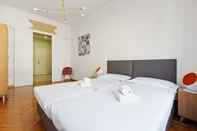 Phòng ngủ Roomy Apartment Duomo & San Babila