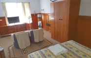 Kamar Tidur 5 Robe Heaven Motel