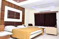 Kamar Tidur The New Holiday Inn