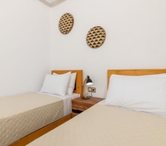 Kamar Tidur 7 Naxian Sunset Luxury Villas