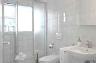 Phòng tắm bên trong Hitrental Cham Apartments