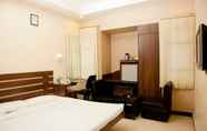 Bedroom 7 Hotel Sheela Towers