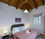 Bedroom 3 Mani Sea View Villa Lida - Luxury near beach