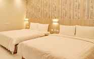 Kamar Tidur 6 Passion Fruit Hotel