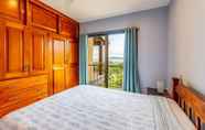 Bedroom 5 Panoramic View of Ocean and Hills in 2BD Flamingo Condo