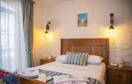 Kamar Tidur 5 Stone Garden Tas Hotel