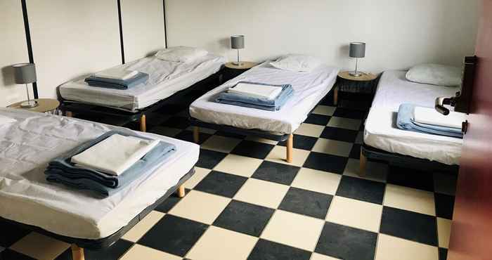 ห้องนอน Hébergements le Camp D'auneau - Le Clos du Camp