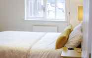 Bedroom 7 ALTIDO Calm 2BR Apt w Parking & Patio, near London Eye