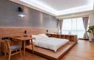 Bedroom 6 Foshan Wowa International Aparthotel
