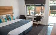 Kamar Tidur 4 Bright Colonial Motel