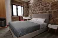 ห้องนอน Alojamento Girassol - Guest House