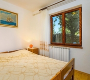 Bedroom 3 Beautiful Home in Kapelica With Wifi and 2 Bedrooms