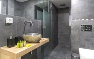 In-room Bathroom 7 Stylish Koukaki Apartment by Cloudkeys