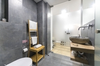 In-room Bathroom Stylish Koukaki Apartment by Cloudkeys