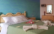 Kamar Tidur 6 Elena's Seaside Holiday House