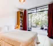 Kamar Tidur 2 Stylish, Bright Apartment w/ Private Garden