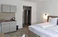 Kamar Tidur 4 M&A Cityapartments Hildesheim