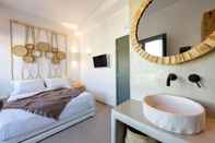 ห้องนอน Acoya Suites