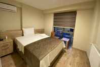 Kamar Tidur Grand Life Hotel