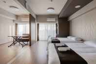 Kamar Tidur Ostay Shin-Osaka Hotel Apartment