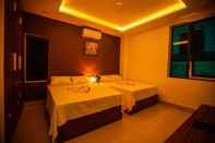 Kamar Tidur Bamboo Green Hotel