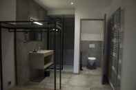 ห้องน้ำภายในห้อง Aux Platanes