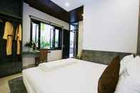 Kamar Tidur Azumi 02 Bedroom on Ground Floor Apartment Hoian With a Full Kitchen Facilities