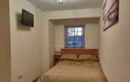 Kamar Tidur 3 Courtyard Cottage - Great Paxton