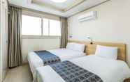 Kamar Tidur 4 Staywell Hotel