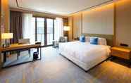 Bedroom 6 Howard Johnson by Wyndham Glory Plaza Qidong