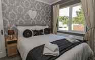 Bedroom 3 Impeccable 3-bed Lodge at Cayton Bay Holiday Park