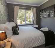 Bedroom 6 Impeccable 3-bed Lodge at Cayton Bay Holiday Park