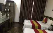 Kamar Tidur 7 Queen Nhan Chinh Hotel