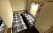 Kamar Tidur 5 3 Bed 8 Berth Caravan in California Cliffs - D53