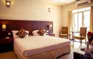 Bedroom 4 Rosewood Apartment Hotel - Pantnagar