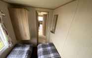 Phòng ngủ 3 3 Bed 8 Berth Caravan in California Cliffs - M1