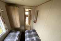 Phòng ngủ 3 Bed 8 Berth Caravan in California Cliffs - M1