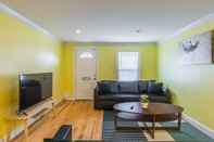 Common Space Beautiful & Huge House w/ grill & foosball table by CozySuites