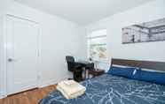 Bedroom 3 Modern Colonial 3BR/2BA House | 5m to DC & DCA, by CozySuites