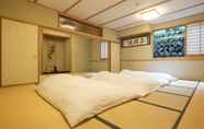 Kamar Tidur 4 Temple Hotel Takeibo