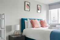 Bedroom Reading Central Serviced Apartment by Flying Butler