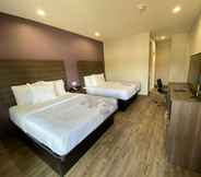 Kamar Tidur 3 SureStay Plus Hotel by Best Western Ada