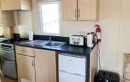 Kamar Tidur 5 Beautiful 3-bedroom Caravan at Mersea Island