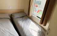 Bedroom 3 Beautiful 3-bedroom Caravan at Mersea Island