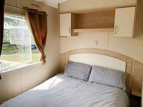 Kamar Tidur 4 Beautiful 3-bedroom Caravan at Mersea Island