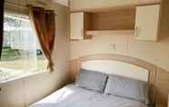 Bedroom 4 Beautiful 3-bedroom Caravan at Mersea Island