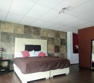 Bedroom 6 Hotel Reco Inn