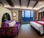 ห้องนอน 5 Ramada by Wyndham Yingshan Jiulongwan Resort