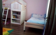 Bedroom 3 Family Friendly 2-bed Cottage in Periș