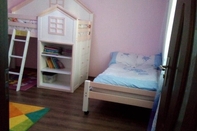 Bedroom Family Friendly 2-bed Cottage in Periș